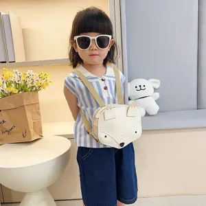 Cute white fox-shaped mini backpack for kids worn by a toddler girl in casual outfit