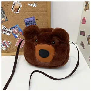 Close-up of a cute brown plush bear crossbody bag with soft faux fur and adjustable strap