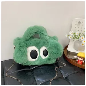 Bolso bandolera de peluche verde con diseño de ojos grandes y correa de cadena dorada
