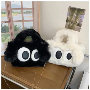 Bolsos de peluche blancos y negros con grandes ojos de dibujos animados y cadena de oro
