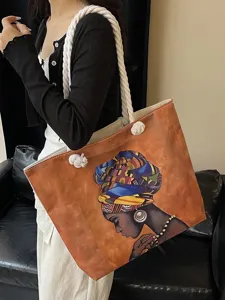 Elegante modelo con bolso tote naranja, estampado de mujer africana y asas de cuerda blanca.