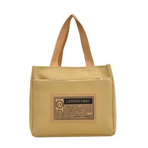 Japanese style yellow canvas tote bag for commuting and casual lunch box storage