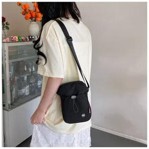Minimalistische lichte zwarte nylon crossbody tas voor meisjes met verstelbare schouderriem