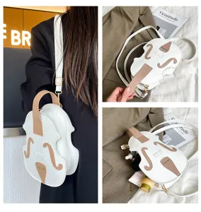 Close-up view of a unique violin-shaped white and tan mini backpack for women.