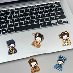 Nahaufnahme von Q-Version traditionellen chinesischen Charakter-Aufklebern auf Laptop