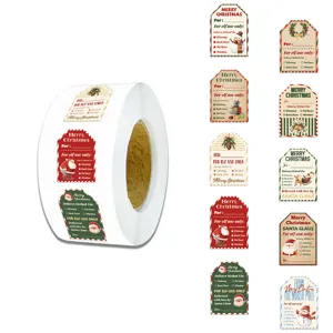 Rol met 500 kerstcadeaulabels stickers met feestelijke cartoonontwerpen