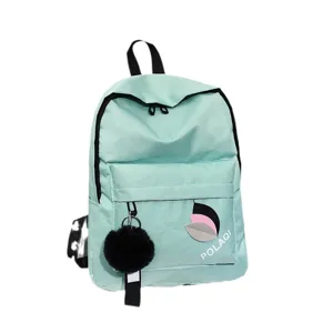 Leichter minzgrüner Canvas-Rucksack mit schwarzem Bommel-Anhänger