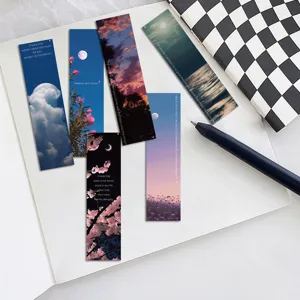 Detailed view of artistic landscape bookmarks with poetic English quotes and sky patterns