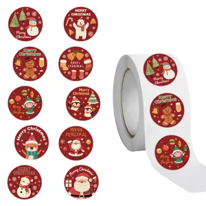 Gedetailleerd overzicht van een rol met 500 kerststickers met Kerstman- en sneeuwmanmotieven