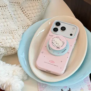 Vue macro d'une coque iPhone rose avec un support chat mignon et des étoiles.
