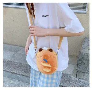 Detailed close-up of a cute Capybara plush crossbody bag with cartoon bread design