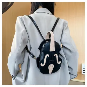 Rear view of a model wearing a creative violin-shaped black mini backpack over a blazer