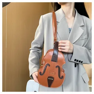 Vintage brown violin shaped crossbody bag for women styled with a casual grey blazer suit