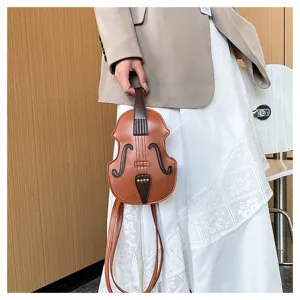Stylish violin-shaped crossbody bag for women shown in a detailed lifestyle shot.