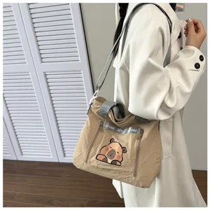 Large capacity Japanese style tote bag with a cute capybara cartoon print for school.