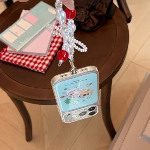 Close-up detail of cartoon phone case with white and red beaded picnic theme lanyard