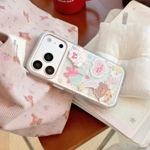 Close-up of cute cartoon rabbit and bear stickers on a transparent iPhone case.