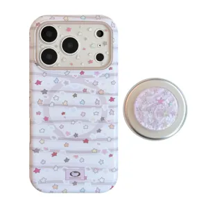 Funda magnética iPhone con estrellas en tonos pastel y soporte circular para móvil a juego