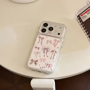 Close-up of stylish pink leopard bow patterns on a transparent iPhone protective case.