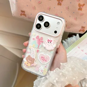 Detail shot of cute cartoon phone case with 3D bear and rabbit motifs on clear back