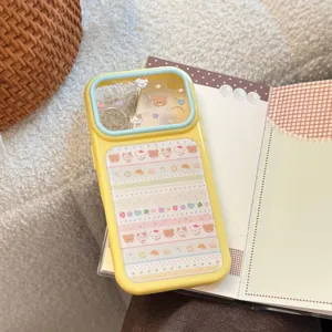Detail view of cute cartoon animal pattern iPhone case with yellow protective frame design