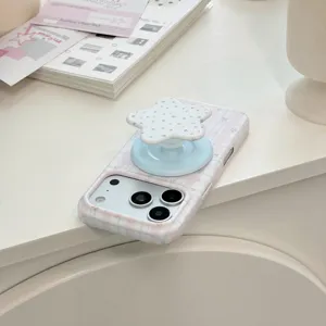 Detailansicht der rosa Stern-Karo-Handyhülle mit passender Stern-Halterung für das iPhone