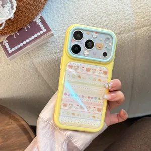 Close-up of yellow iPhone case featuring cute cartoon animal patterns and acrylic finish