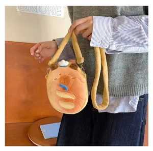 Cute Capybara plush crossbody bag held by a person in a cozy, casual indoor setting.