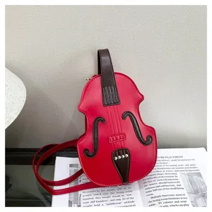 Detailed view of the unique violin shaped design of the red fashion crossbody bag
