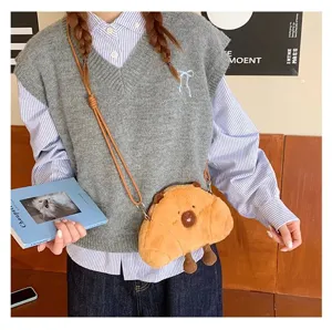 Cute capybara plush crossbody bag in a stylish croissant-like shape for young girls