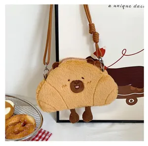 Detailed view of a cute capybara plush crossbody bag featuring soft brown faux fur texture.