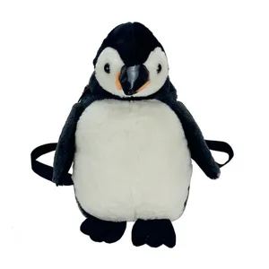 Süßer Pinguin-Plüschrucksack mit weichem weißem Fell und verstellbaren schwarzen Trägern.