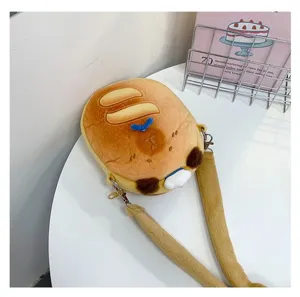 Detail view of the cute capybara plush crossbody bag with soft furry shoulder strap.