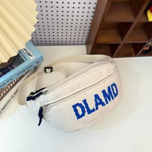 Close-up of white nylon crossbody sports chest bag with blue DLAMD print