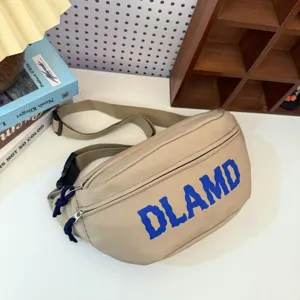 Casual beige nylon chest bag with bold blue DLAMD lettering and an adjustable strap