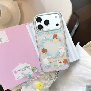 Detailed view of a cute bunny pattern iPhone case with a colorful beaded charm chain