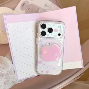 Close-up of pink apple phone case with cute starry patterns and matching grip stand