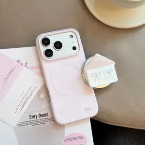 Close-up of pink polka dot iPhone case with cute magnetic house-shaped phone grip
