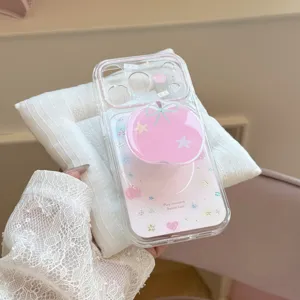 Detail of pink apple phone grip on transparent iPhone case with sweet Korean design