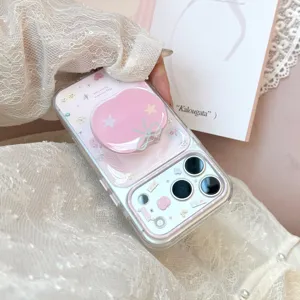 Macro view of a sweet pink apple phone grip on a clear iPhone case with lace details.