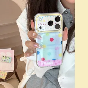 Detail of a dopamine style iPhone case with colorful polka dots and star patterns
