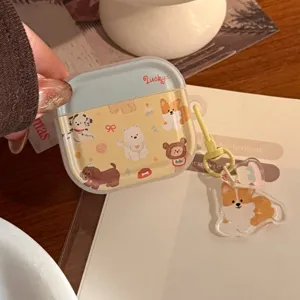 Close-up of cute dog pattern earphone case for AirPods with corgi keychain accessory