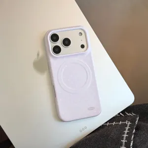 Close-up detail showing the lavender polka dot pattern and MagSafe ring on iPhone case