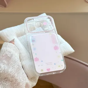 Detailed close-up of a clear iPhone case featuring sweet pink glittery apple and star motifs
