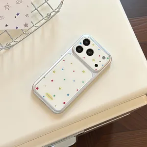 Detail shot of silver iPhone case with colorful gilded star patterns and large lens window