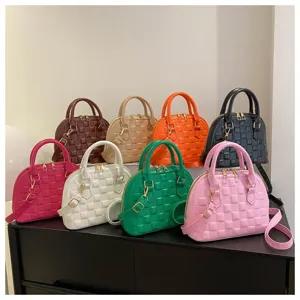 Elegante juego de bolsos de mano con textura de concha en varios colores vibrantes para mujer