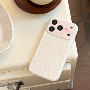 Detailed view of white iPhone case featuring pink floral print and cute bear design