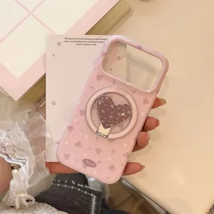 Λεπτομερής όψη ροζ θήκης iPhone με λουλούδια και κομψή βάση δαχτυλιδιού σε σχήμα καρδιάς