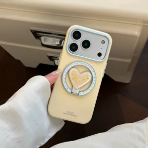 Vue détaillée de la coque magnétique jaune pour iPhone avec support cœur et motif étoiles