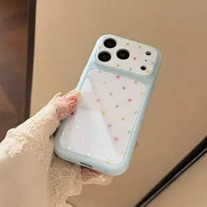 Macro detail of a light blue iPhone case featuring a white panel with colorful star patterns.